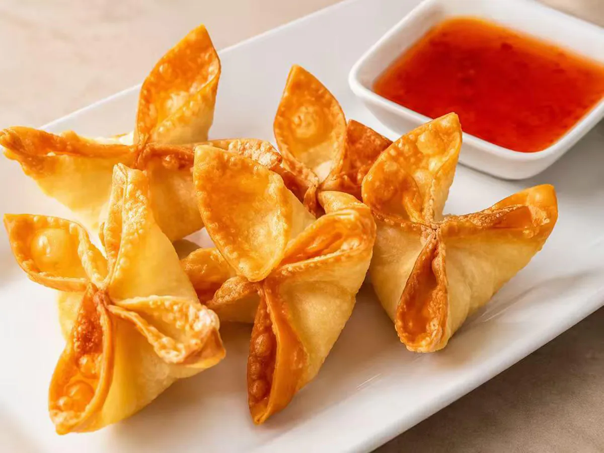 Crab rangoon with sweet sauce at Mei's kitchen, a Chinese Restaurant in Knoxville